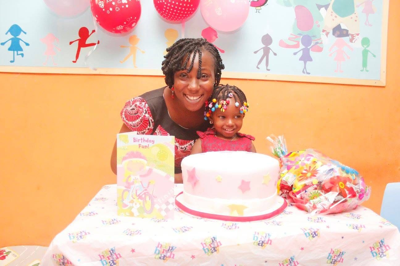 A family celebrating a birthday at Seraphic Kidz